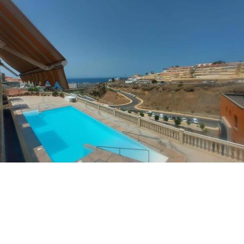 Apartment with view, wifi and pool in Arguineguin