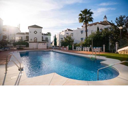 Appartment Mijas with heated swimmingpool and beautifull view frontline golf