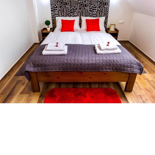 Aqualiget-Apartmanház