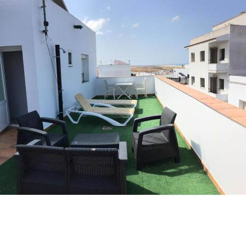 Arco - Virgen Apartamentos y Habitación