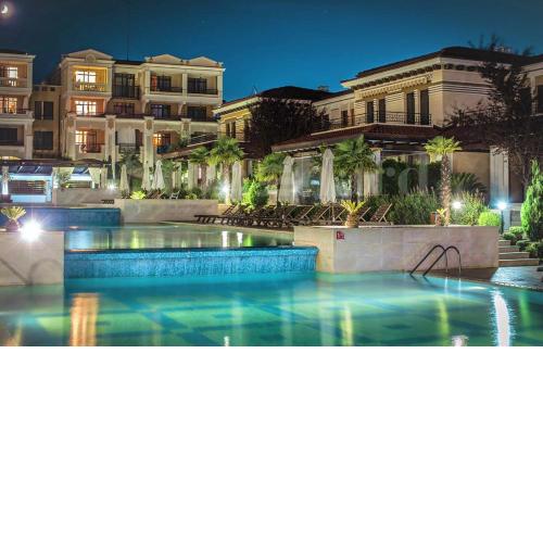 art STUDIO in beach resort - at ground floоr with Terrace and green patio just infront ot the Pool