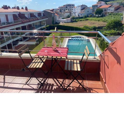 Ático con terraza, piscina y gimnasio