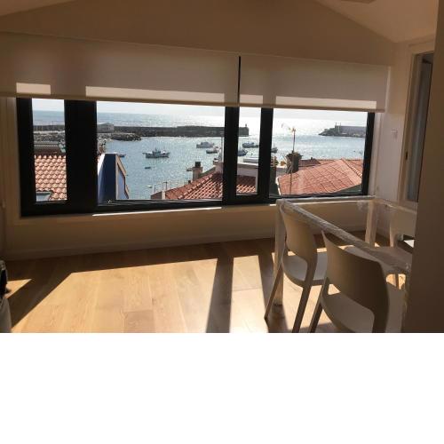 Ático en el puerto con vistas al mar