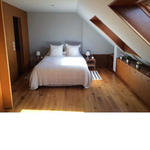 Attic loft to wake up by the sea.