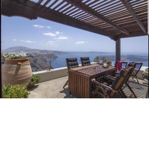 Author's cave house,breathtaking Caldera view!6pax