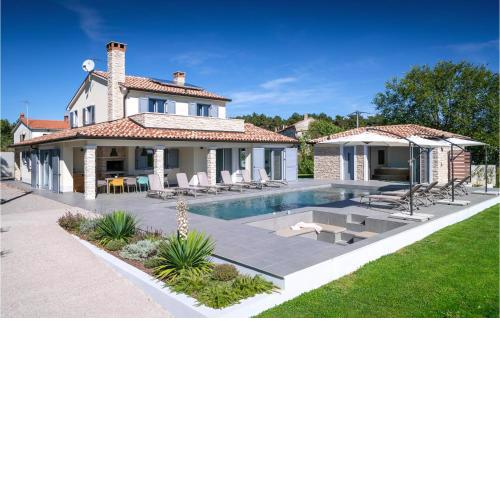 Awesome home in Nedescina with Outdoor swimming pool, Sauna and 4 Bedrooms