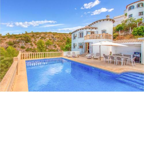 Awesome Home In Pedreguer With Outdoor Swimming Pool, Private Swimming Pool And 4 Bedrooms