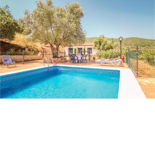 Awesome home in Villanueva del Rey with 4 Bedrooms and Outdoor swimming pool