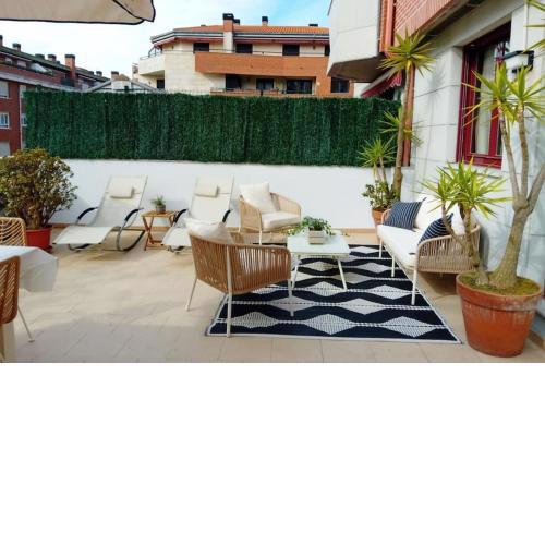 Bajo con impresionante terraza