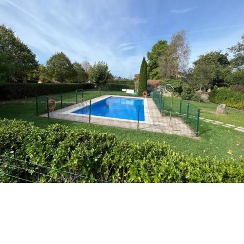 Bajo con Jardin y Piscina!