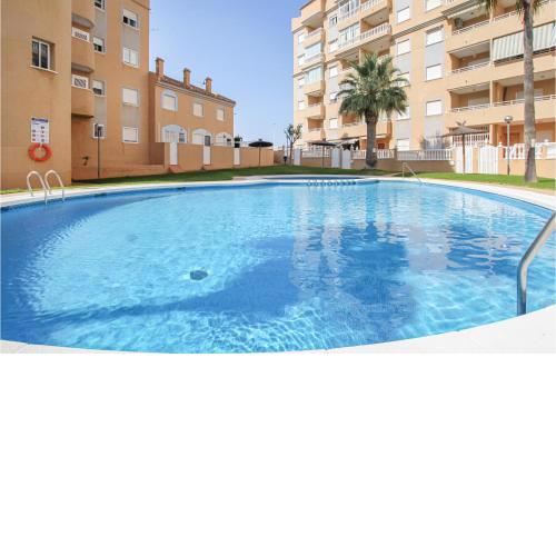 Beautiful Apartment In Los Arenales Del Sol With 2 Bedrooms, Wifi And Swimming Pool
