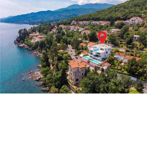 Beautiful apartment in Opatija with Outdoor swimming pool, Heated swimming pool and 4 Bedrooms