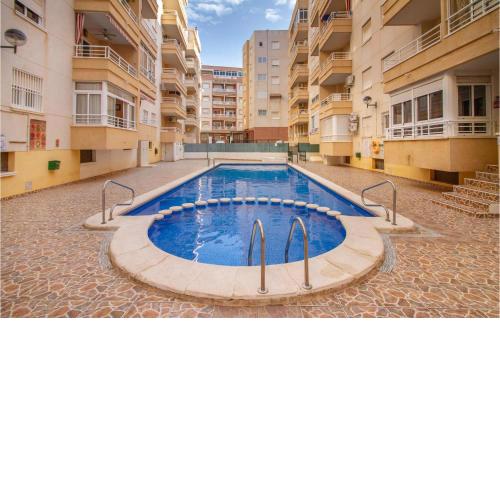 Beautiful Apartment In Torrevieja With Wifi, Outdoor Swimming Pool And Swimming Pool