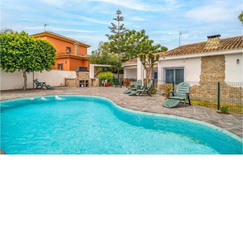 Beautiful Home In Chiclana De La Fronter With Outdoor Swimming Pool, Wifi And 5 Bedrooms