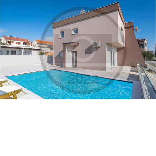 Beautiful home in Maslenica with WiFi, Outdoor swimming pool and 2 Bedrooms