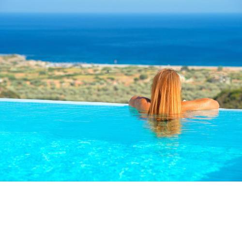 Beautiful new luxury villa with infinity pool, outside kitchen and sea view