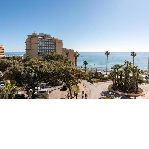 Benalmadena beachfront retreat big balcony and city sea views