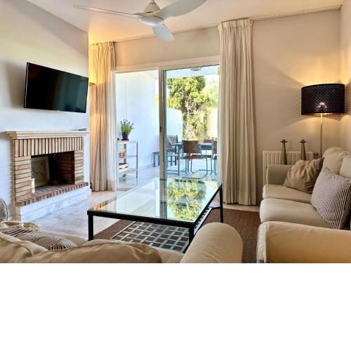 Blue House in Guadalmina Baja, with a large terrace overlooking the Golf