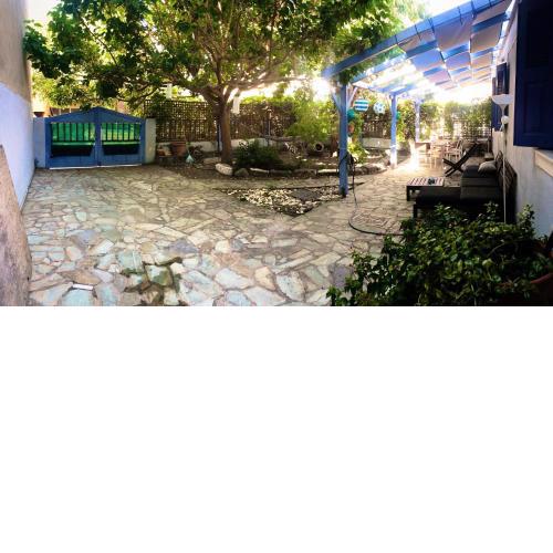 Blue Seaside House with Garden