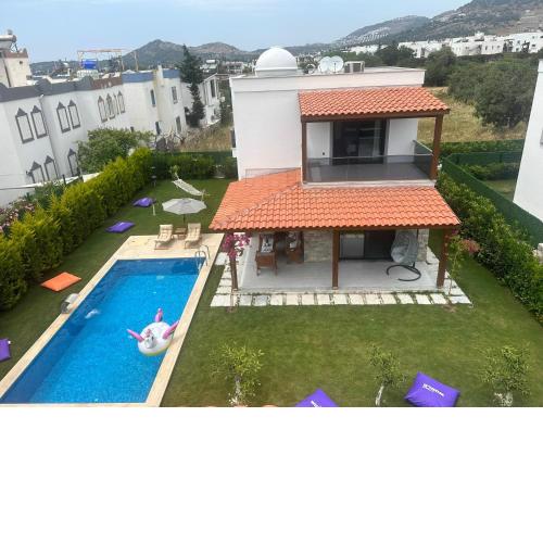 Bodrum Gümüşlükte havuzlu-bahçeli-3 yatak odalı müstakil villa