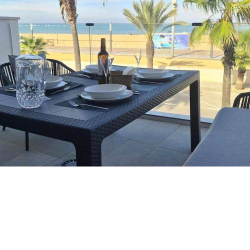 Boutelou playa con vistas al mar