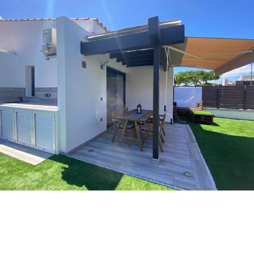 Bungalow 1 Maspalomas Golf con piscina y jardín