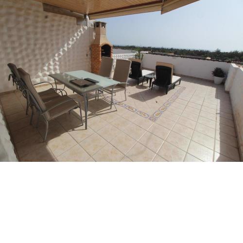 Bungalow con terraza vista al mar