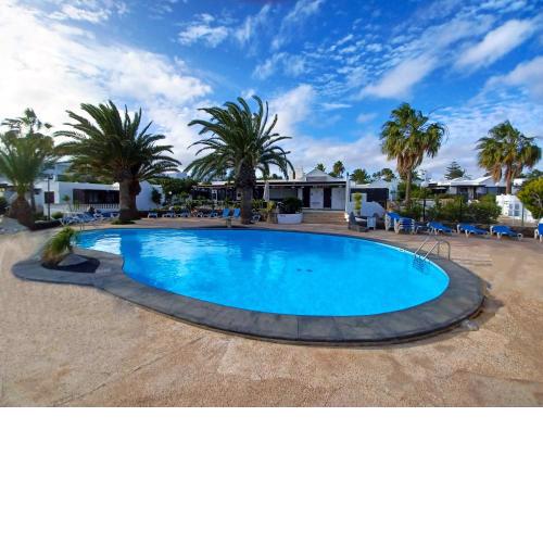 Bungalow Playa Bastian - Piscina climatizada - Wifi - Playa 1 min.