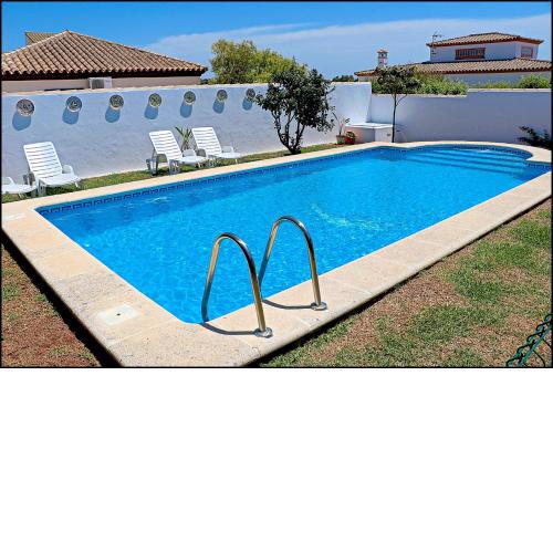 Bungalow Ramos, con piscina compartida