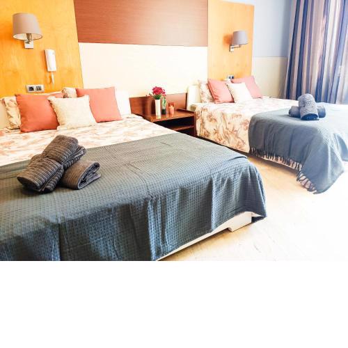 By La Rambla Rooms