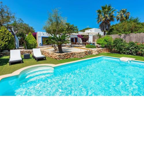 Can Fluixà, con piscina y jardín.