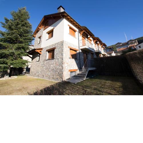 Casa amb jardí Alp