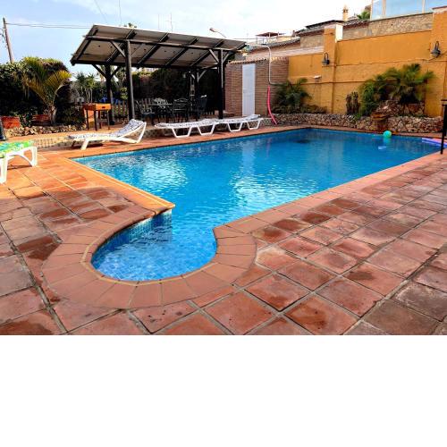 Casa con piscina junto a playa