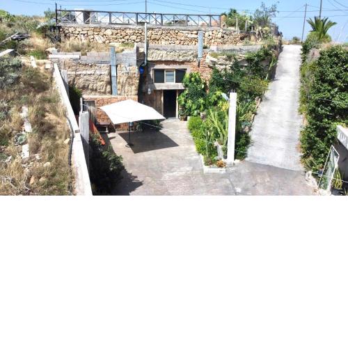 Casa Cueva con barbacoa y vista