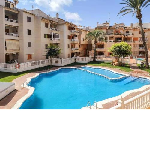 Casa Del Angel , Cosy 2 bed apartment,150m from Playa Los Locos plus beautiful swimming pool
