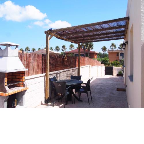 Casa en l'Ampolla, patio y bbq, cerca de la playa.