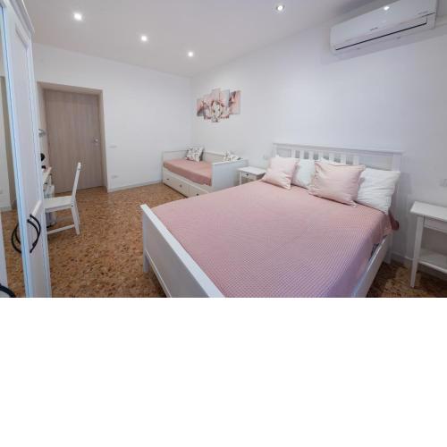 Casa Rosa Beige e Blu