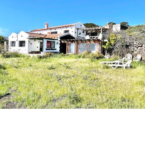 Casa rural con vistas al mar y terraza con barbacoa en Isora