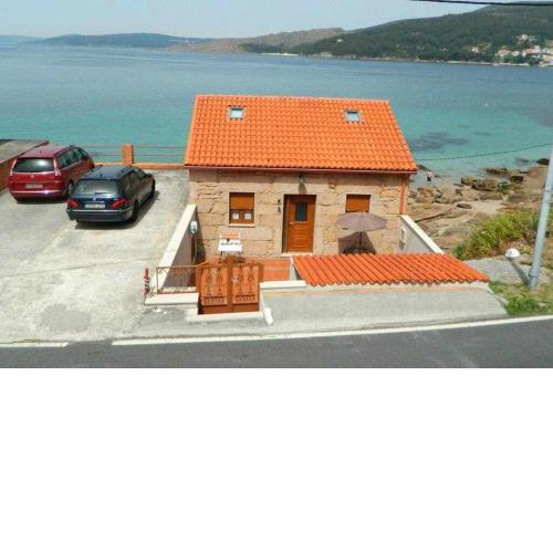 Casita con terraza al lado del mar en O Pindo