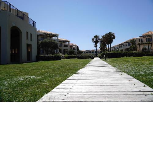 Cassiopeia 2-Bedroom Lower Apartment on the beach with pool