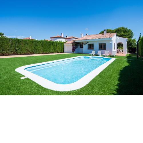Chalet a pie Cala Forn con piscina