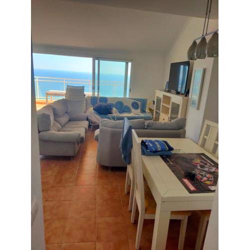 Chalet adosado sobre la playa