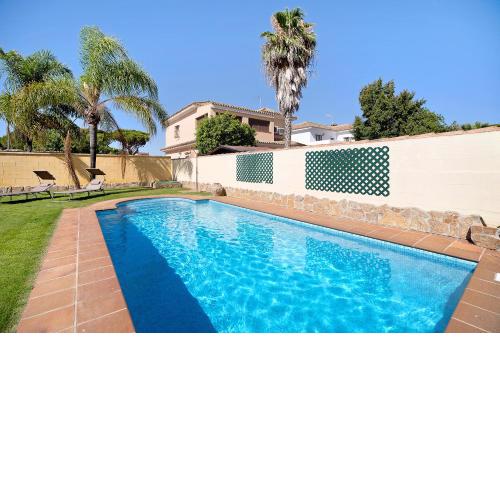 Chalet con piscina en la Barrosa