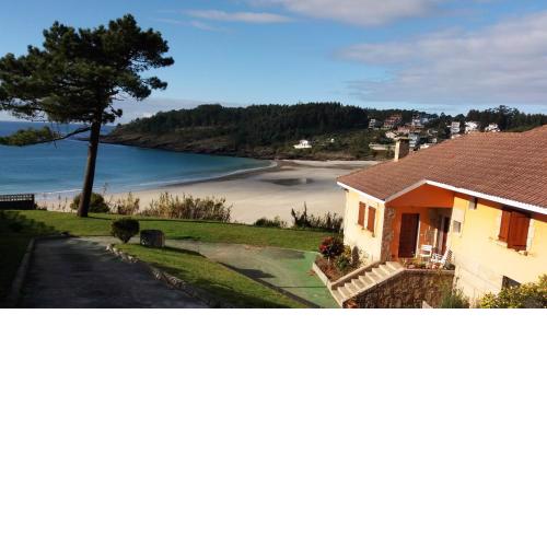 Chalet sobre playa canelas, EN SANXENXO