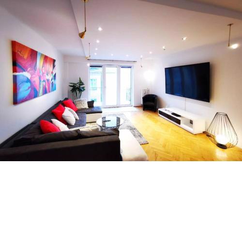 Charmante Zentrumswohnung mit Balkon und 80 zoll TV