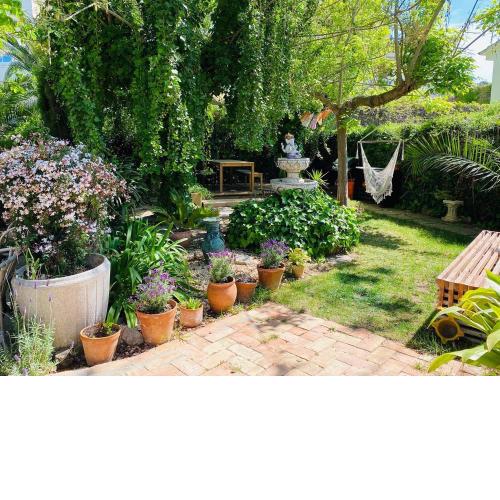 Charming apartment in a duplex with garden & balcony