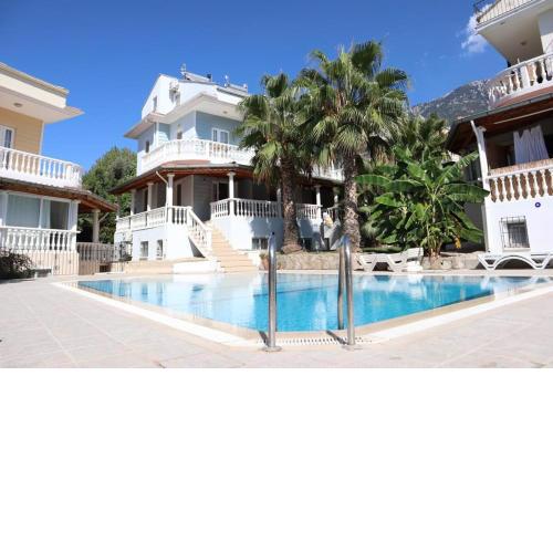Cheerful 4 bed villa with pool 5 mints 2 Oludeniz