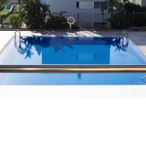 Coastal apartment with terrace and pool