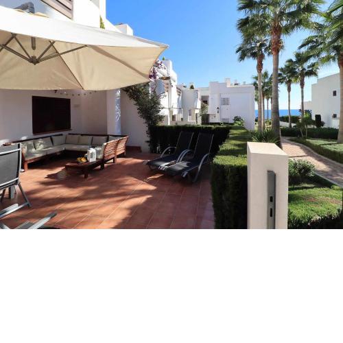 Colibri bonito apartamento jardín piscina comunitaria cerca playa
