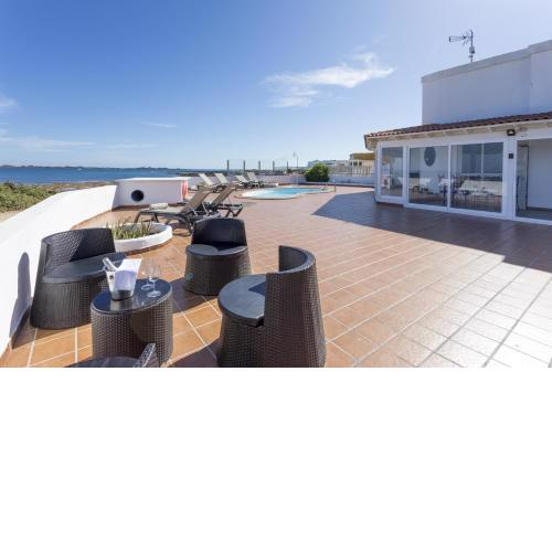 Corralejo Beachfront Villa Remos with Lobos Island View, Private Pool, Wifi & BBQ by Amazzzing Travel